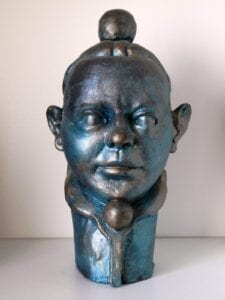 CABEZA DE MALABARTISTA. Arqueológicas en Escultura